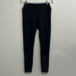 Splits59 black full length yoga leggings with mesh detail on legs size medium